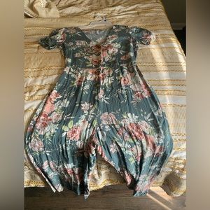 Sage floral jump suit size Med.